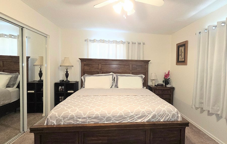Spacious master bedroom with king-size bed