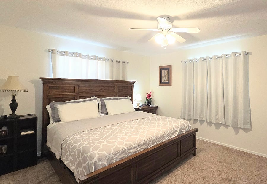 Spacious master bedroom with king-size bed