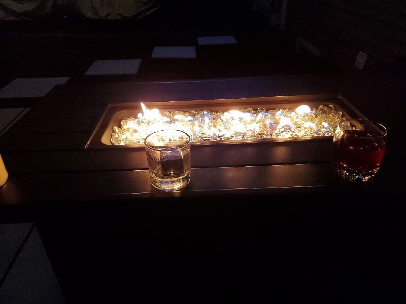 Patio at night...fire table.