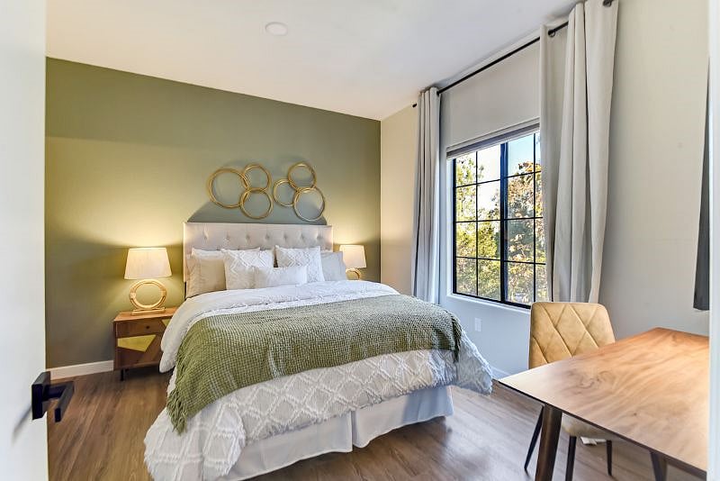 Relax in style in our contemporary master bedroom, complete with an ensuite bathroom for ultimate convenience