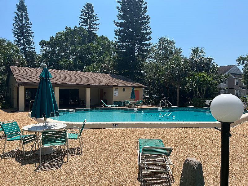 Swimming pool is large for a complex this size.  It's heated in the winter and chilled in the summer.  It's just steps from your front door.  There are restrooms in the clubhouse. 