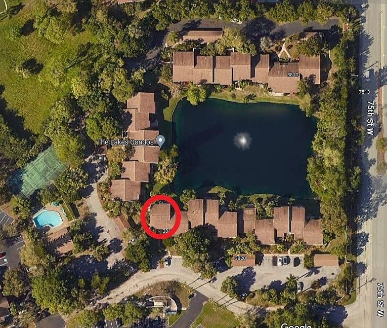 Bird's eye view of The Lakes - 1 Comfy Condo is circled - see how close you are to the pool!! To the far right, the wooded area offers a serene walking path along the lake's edge.