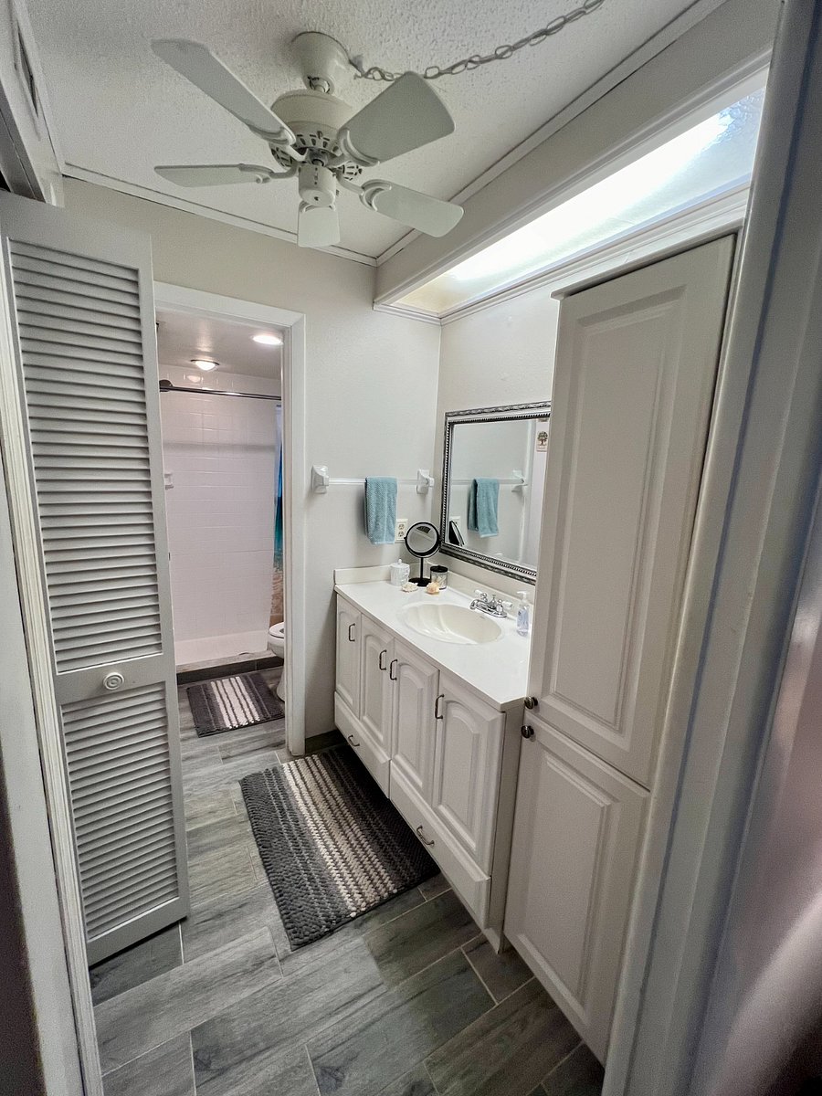 Pocket doors allow for privacy from bedroom or from "dressing area" to toilet and shower.  Lots of counter space.