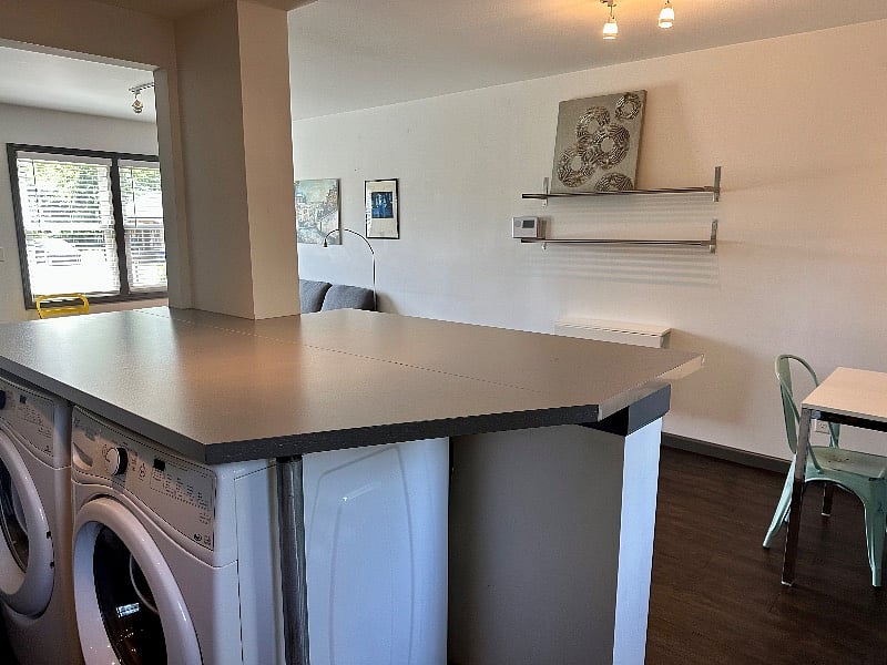 Full size washer and dryer under kitchen island