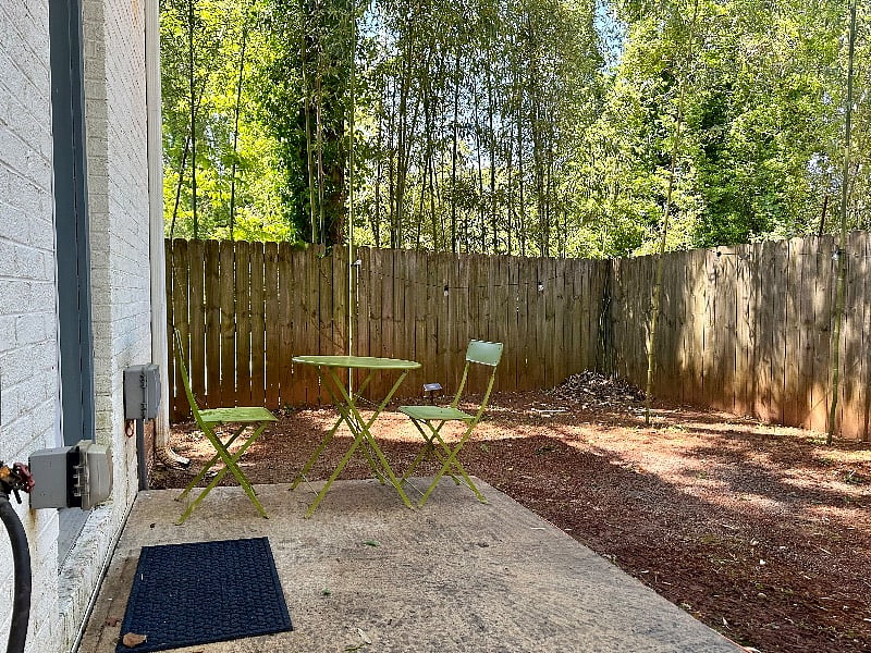 Fenced in backyard, private patio, fire pit