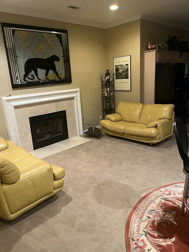 sitting room with fireplace and dinning