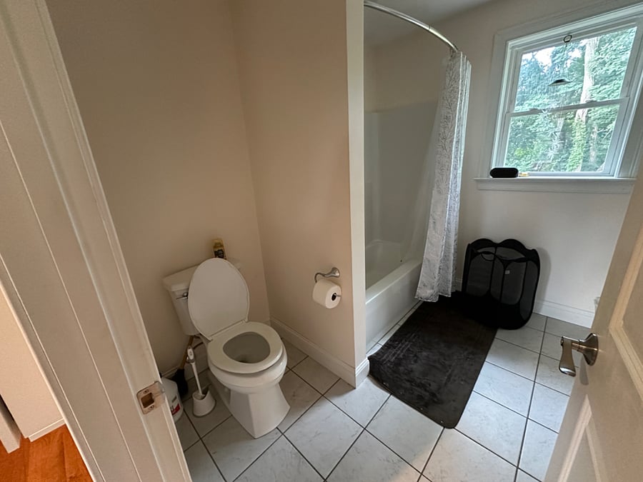 Private Bathroom: Full-sized tub and shower. Toilet tissue provided. Cleaning products, broom, and paper towels also provided for tenant cleaning purposes.