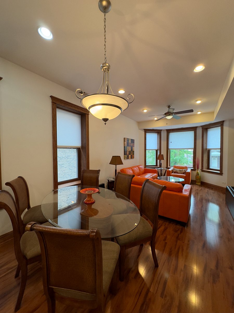 Dining room has table with 6 chairs.