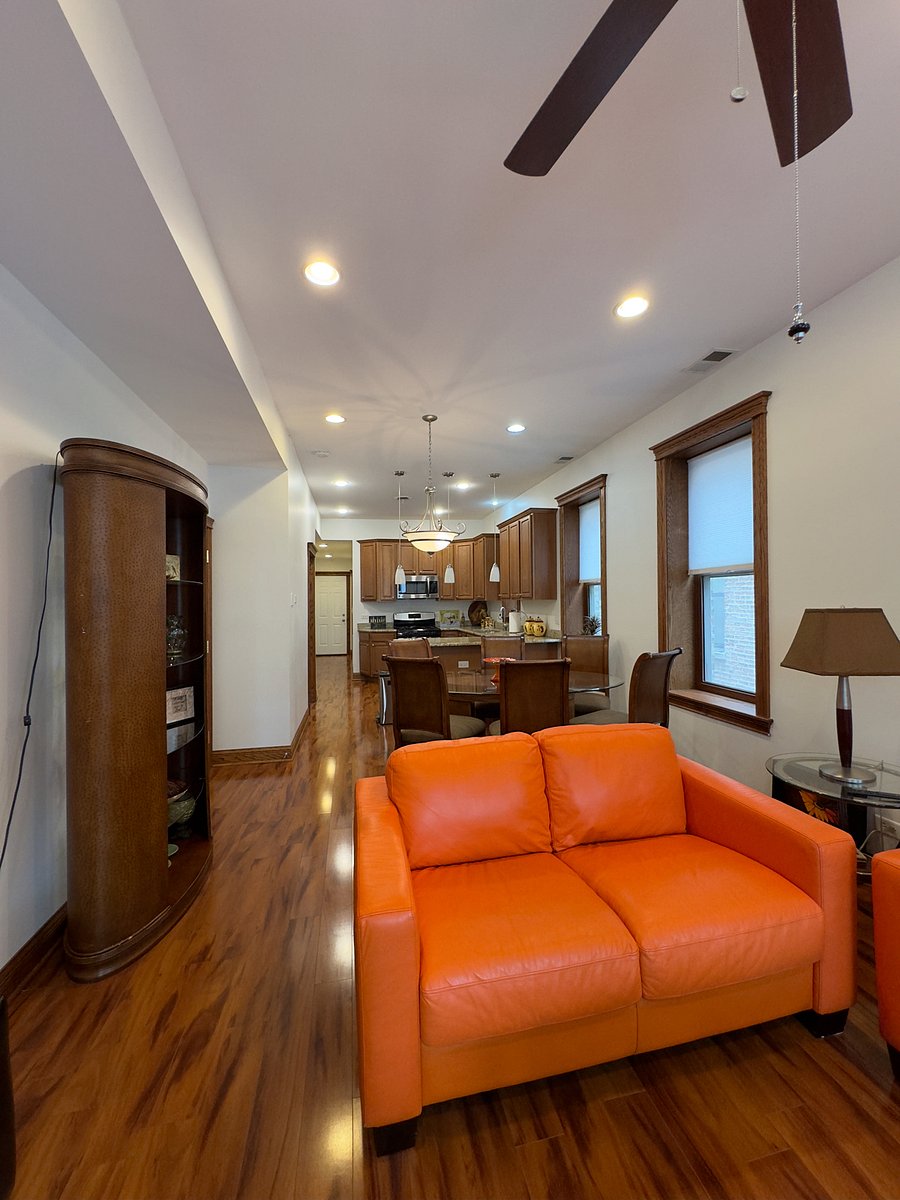 View from living room to dining room and kitchen.