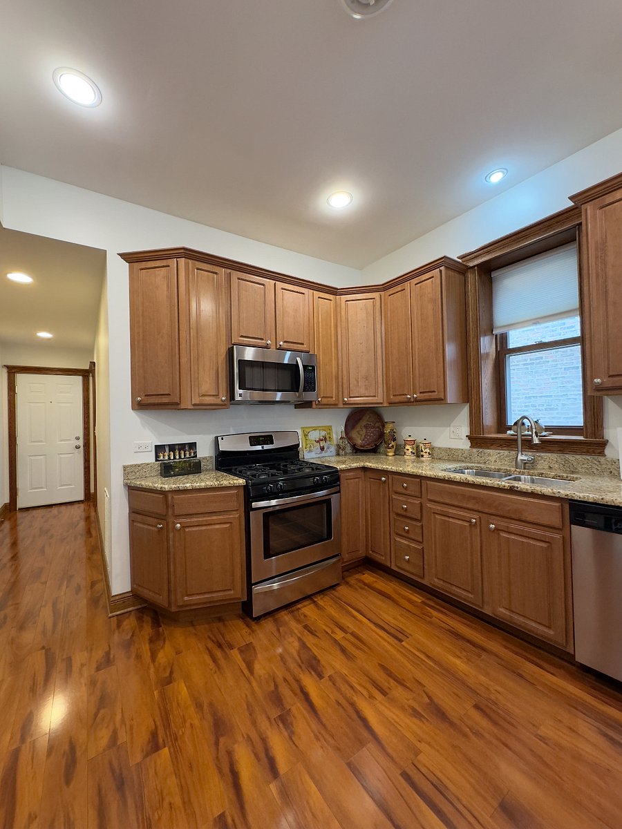 Kitchen has all stainless steel appliances including the dishwasher.