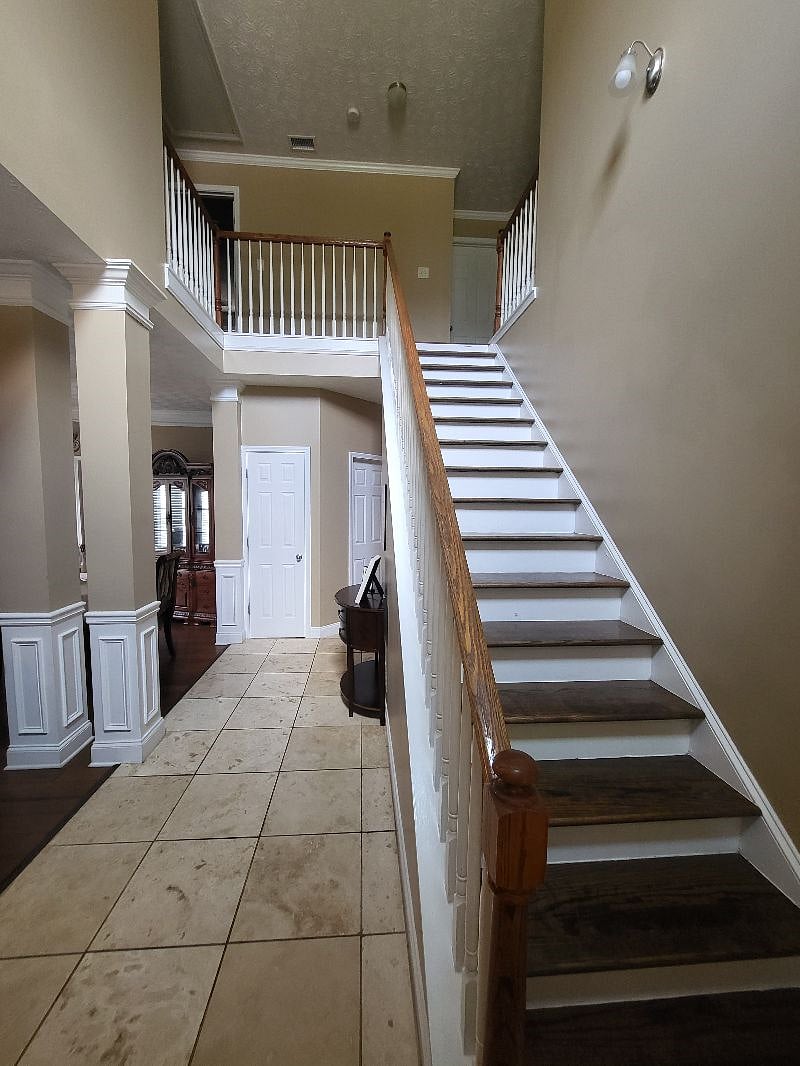 Stairs lead to all bedrooms
