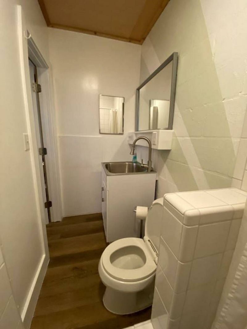 Bonus unit full bathroom with utility sink.