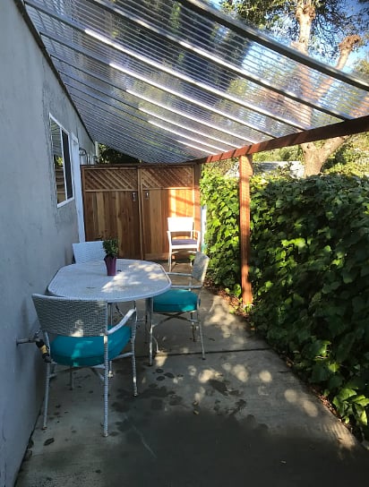 JUST ADDED! COVERED OUTSIDE PATIO. TINTED TO SHADE THE SUN, BUT PROTECTS FROM RAIN AND NOISE. ANOTHER 200 SQ. FEET OF USABLE SPACE. SAN RAFAEL WEATHER MAKES THIS AREA USEABLE SPACE, ALMOST ALL THE TIME. PLUS VIEW OF THE SAN FRANCISCO BAY & BRIDGE!