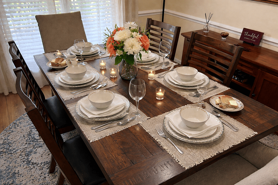 Elegant dining space with a beautifully set tableideal for shared meals or quiet evenings at home.