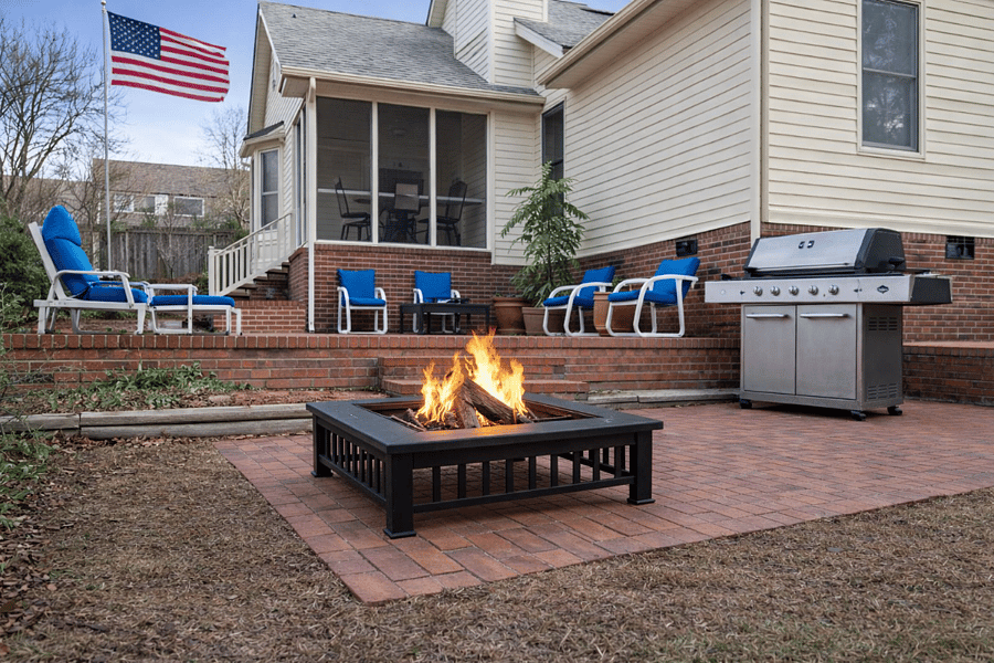 Full barbecue grill setup for easy outdoor cooking, paired with a fire pit for relaxing evenings and casual gatherings.
