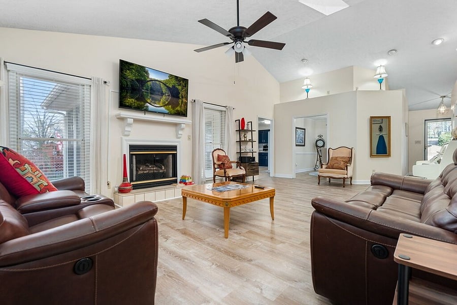 Bright, comfortable living space with reclining seatingperfect for relaxing after a long day or unwinding with your favorite shows.
