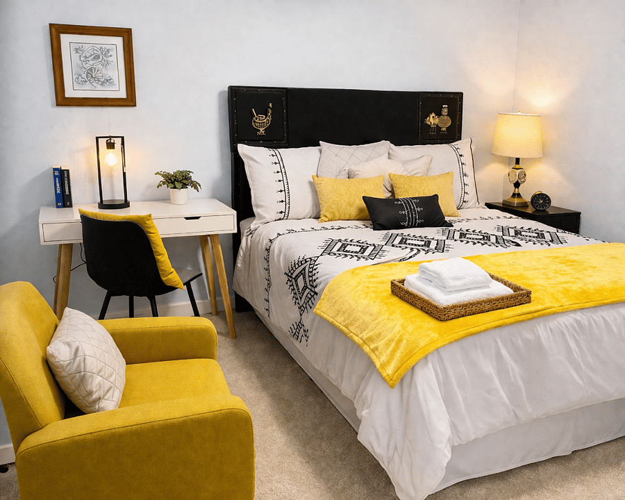 Comfortable, thoughtfully designed bedroom with Smart TV and workspaceideal for rest and productivity.