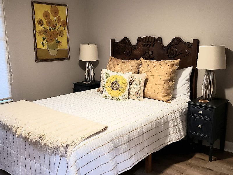 Queen bed with brand new quality mattress.