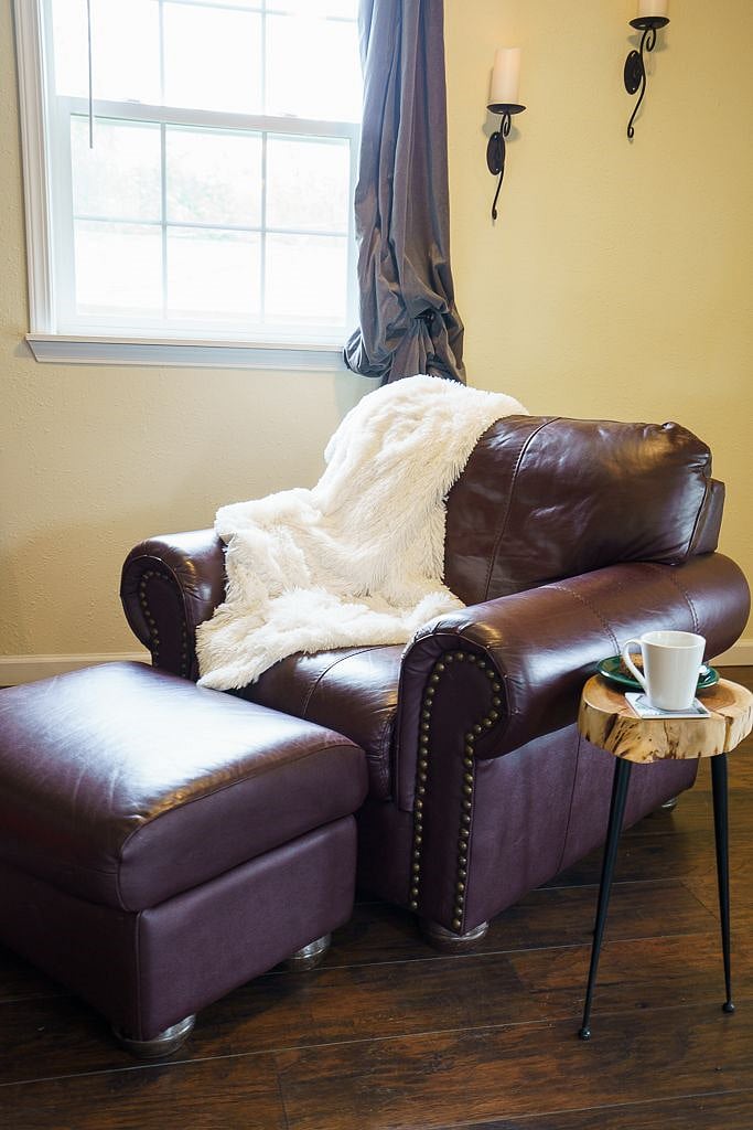 Leather lounge chair by the window