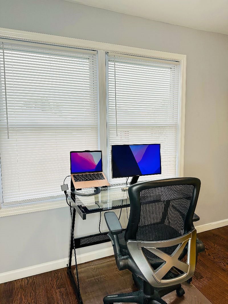 Bedroom 1: Remote workspace equipped with a monitor and smart hub connections