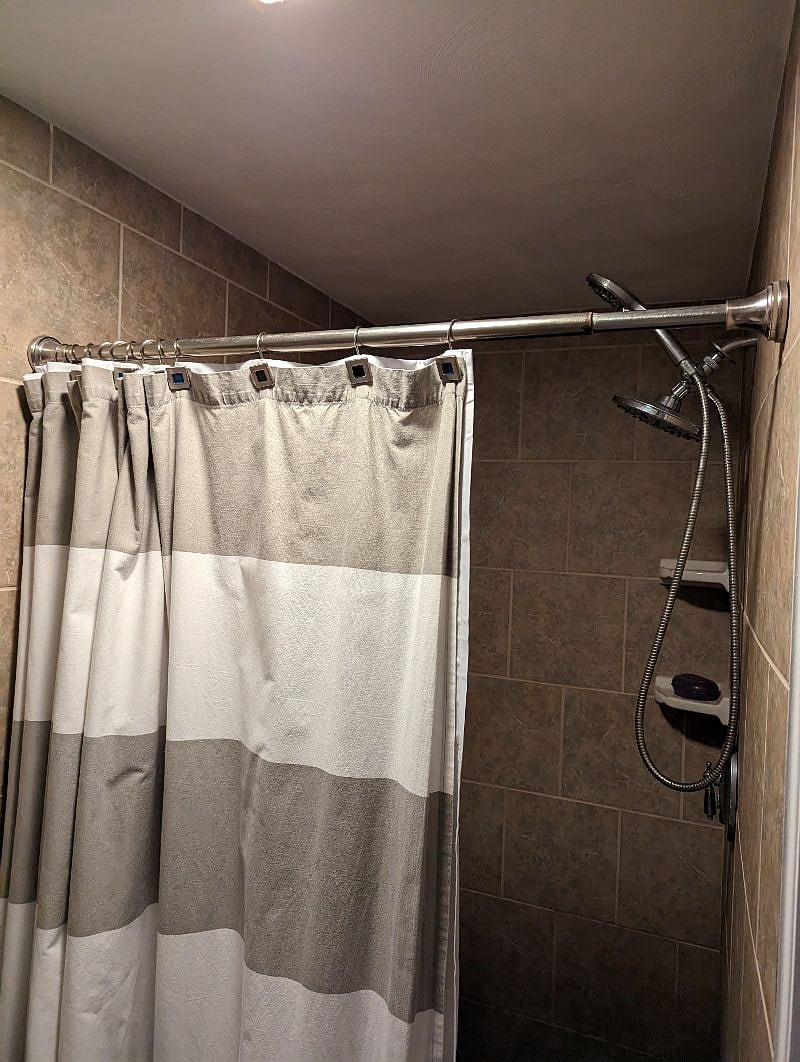 Standing Shower has duel heads great for showers after a long day.