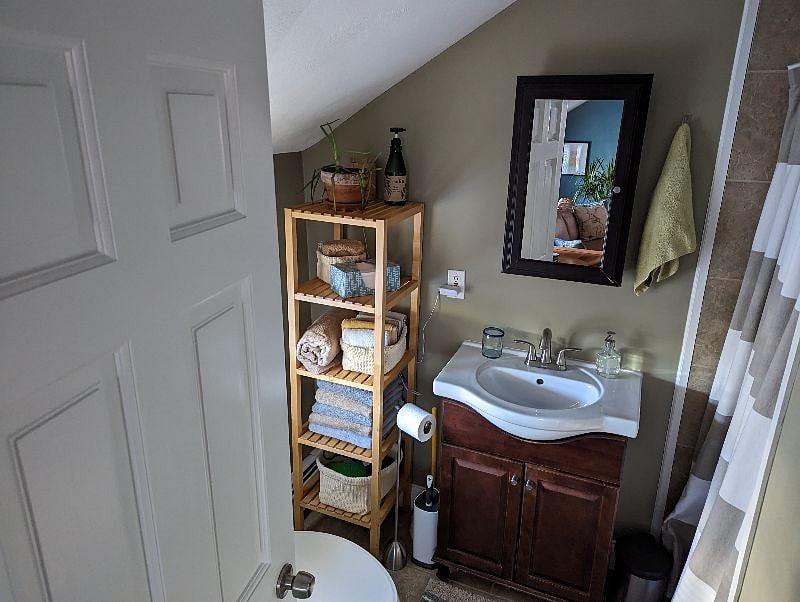 Bathroom has plenty of towels.