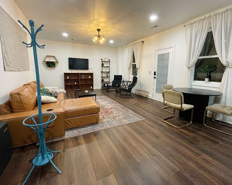 Comfy couch by TV in the living area.