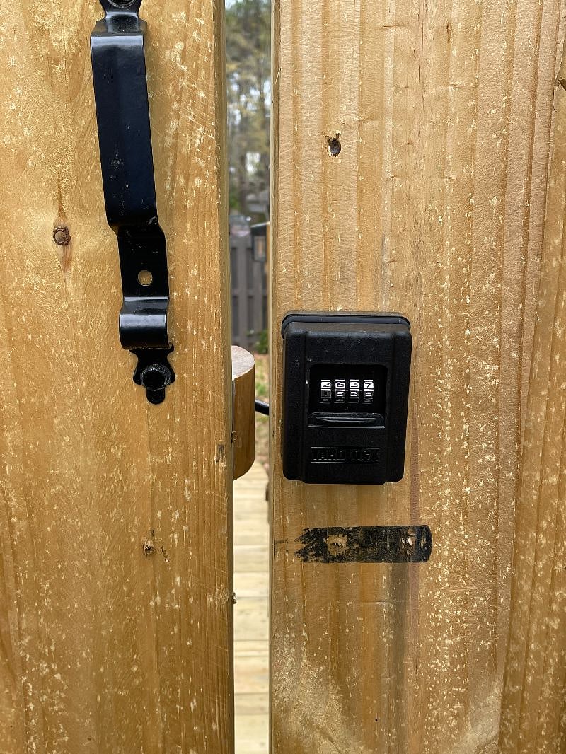 Lock box to private entrance. Enter your code and pull the face of the lock forward to enter.