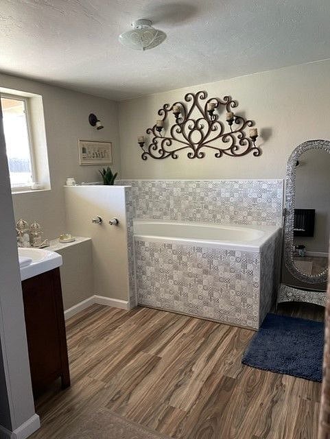 Master tub. There is walk-in shower as well