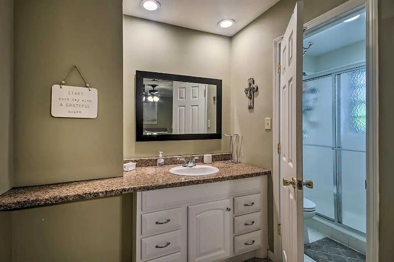 Master bedroom dressing area and view to shower area