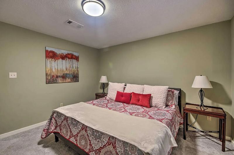 2nd bedroom with King bed and dresser