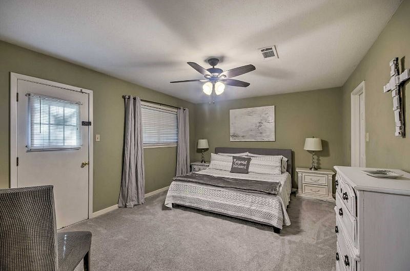 King bed in Master Bedroom with walk in closet and dresser