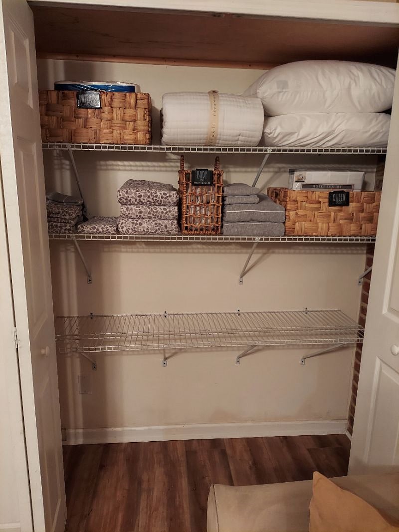 The Linen Closet (Right), also located in the Living Room.