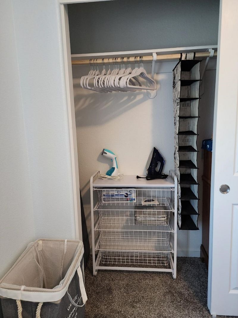 Plenty of storage space in your closet, complete with full size ironing board, iron, and clothes steamer.