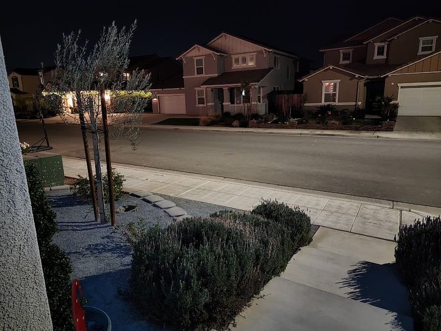 This is actually a photo taken at night to show how safe and well-lit our street is. Parking for our renters is available directly in front of our home.