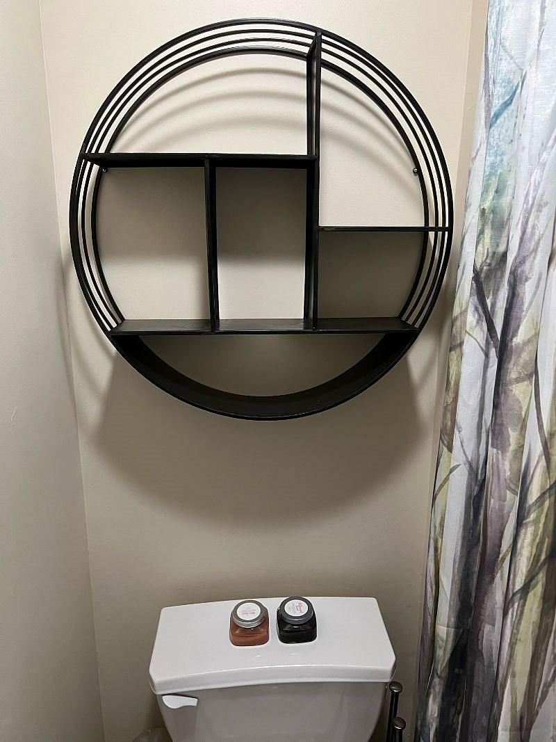 1 Bathroom - Shelving with tub and shower