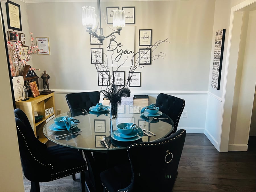 Beautifully decorated dining room with coffee bar