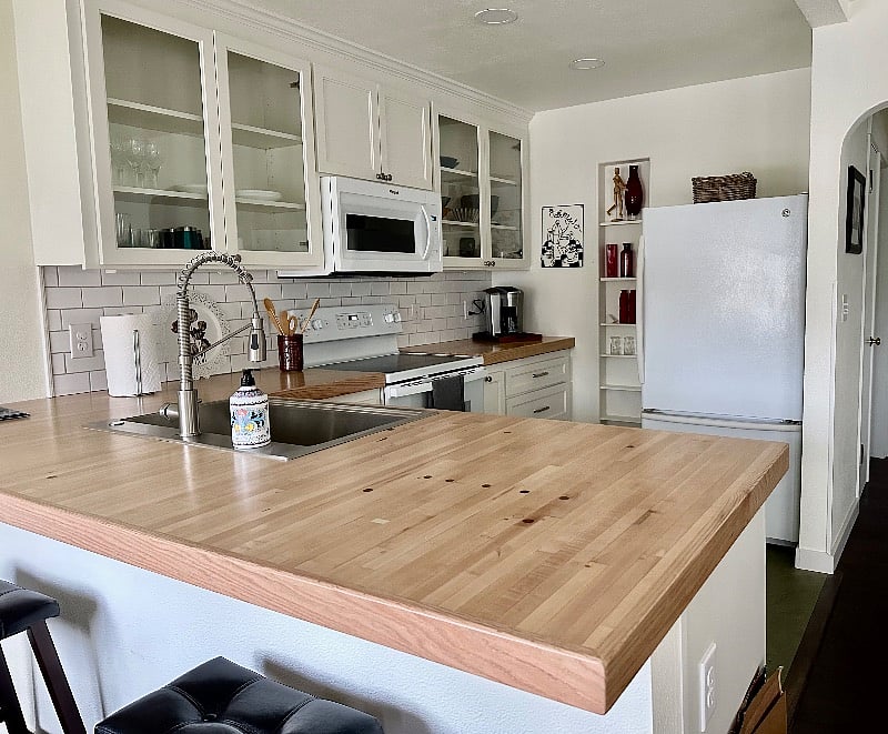 Special touches throughout. Kitchen features countertops that were formally a bowling alley.