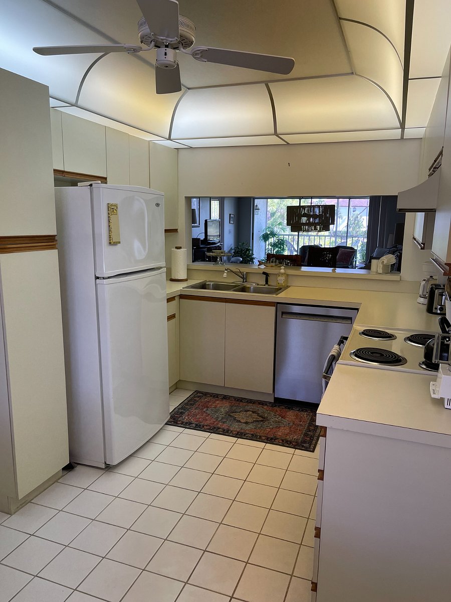 Kitchen with plenty of cabinets. Includes plates, glasses, cooking pots/pans, baking supplies.
