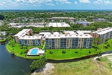 Walk out the screen door to the pool! This unit is literally by the pool!