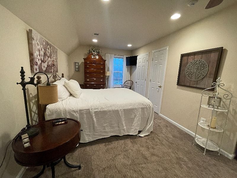 A queen size Bed with a down filled feather mattress awaits you when end your day. Highboy to keep your things. A small makeup mirror is in the highboy if needed.