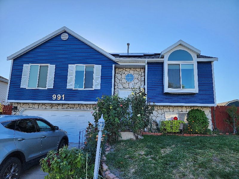 We painted the house last summer and love the eye-popping color!