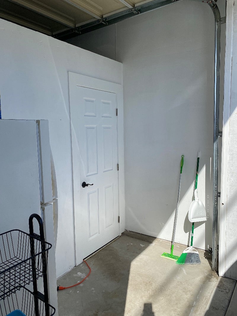Full size fridge in the storage space, room for more storage, a bike, etc.