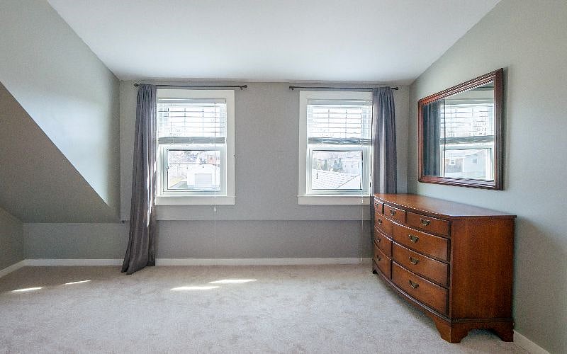 Photo does not show a desk which is under these windows