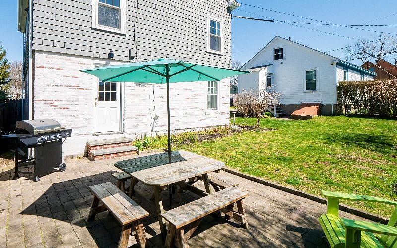 Gas grill on side patio