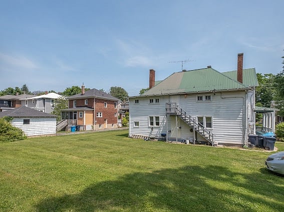 Back yard and off street parking area.