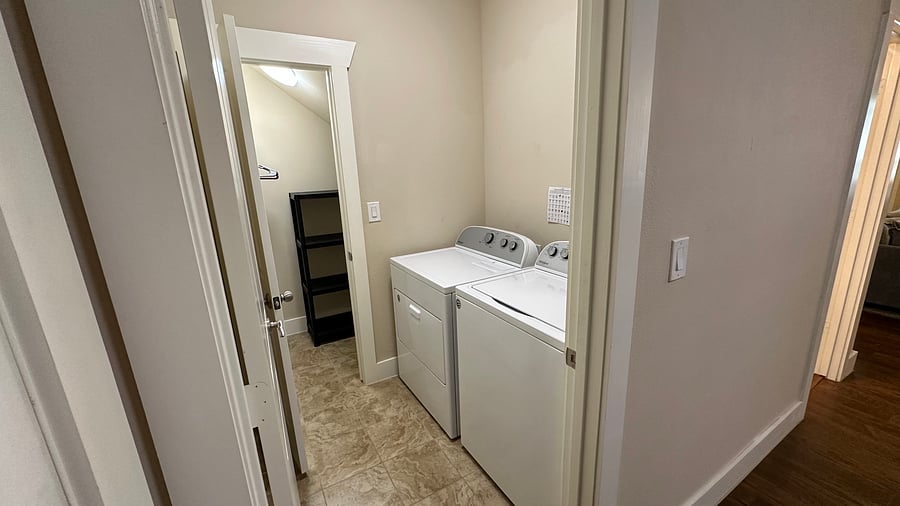 Washer and dryer. Back closet room.