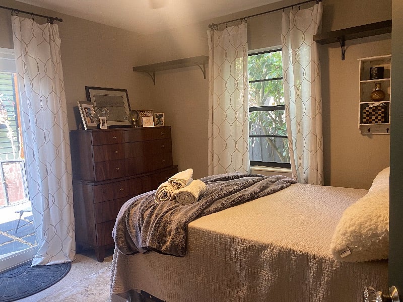 3rd bedroom with access to side garden fire pit