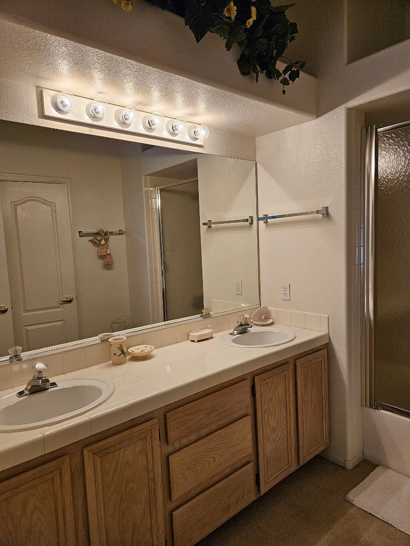 Primary bathroom with roman tub and shower