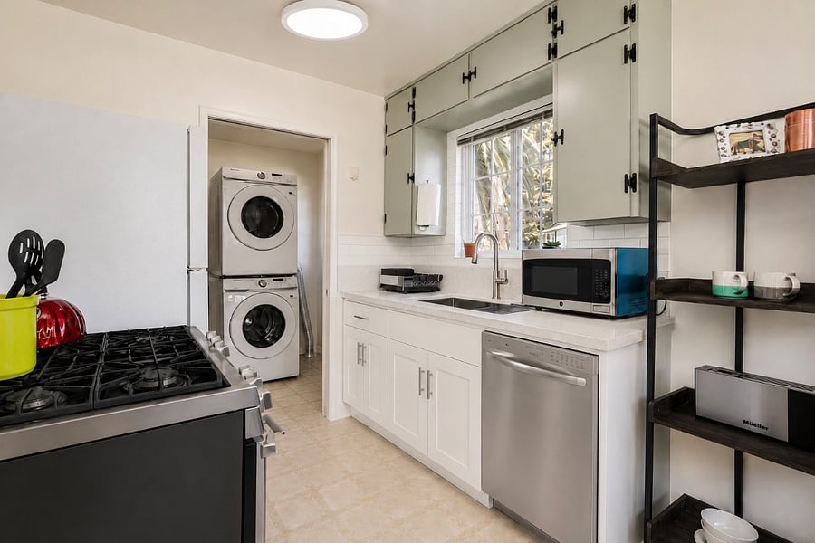 Full kitchen with in-unit washer and dryer, dishwasher and stove